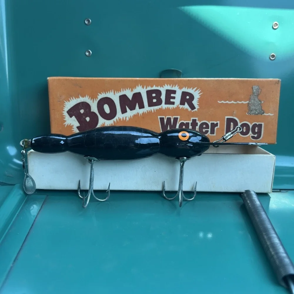 bomber water dog fishing lure Vintage Bait Co Red & White In Box For Sale The Bomber Heavy Duty Long A was built to withstand the hardest hitting fish in the sea Bomber WATER DOG Lure (